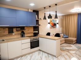 Дизайнерская кухня-студия с крашеными фасадами